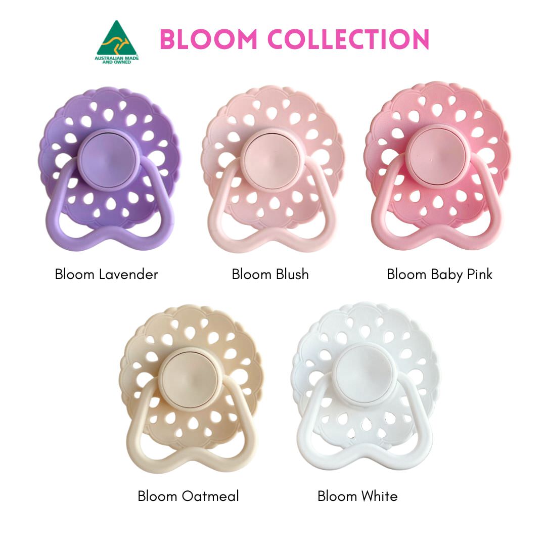 Bloom collection baby dummies colour chart showing lavender, blush, baby pink, oatmeal and white dummies with hold me handles