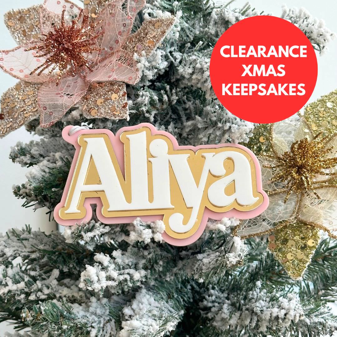 Personalised triple layered Christmas tree ornament.