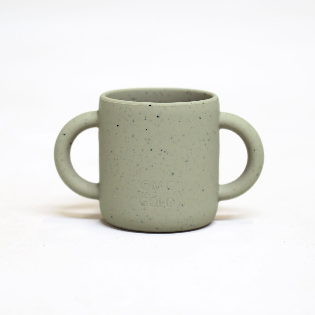 Sage green silicone baby sippy cup with dual handles for easy toddler grip