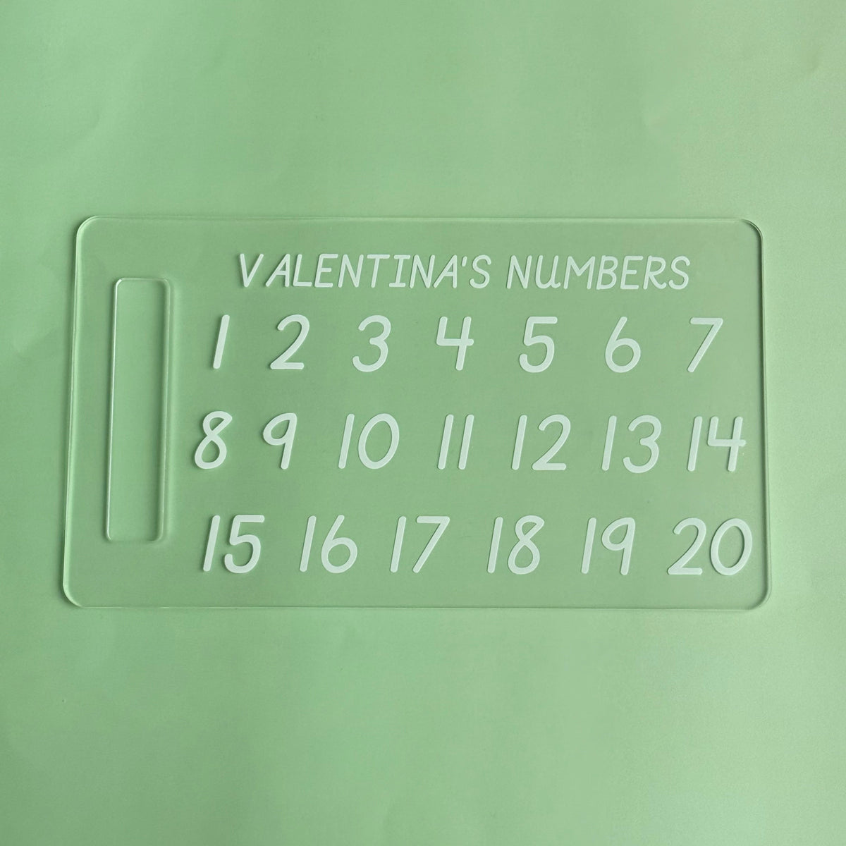 Personalised acrylic learning board engraved with the name Valentina, featuring numbers, practice for early learning and fine motor skills