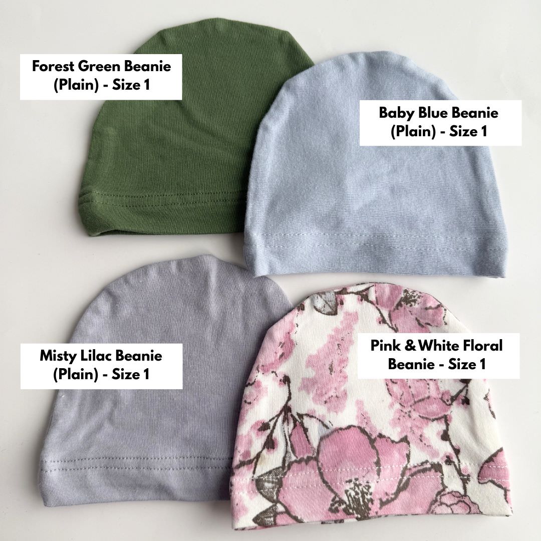 Clearance size 1 baby beanies including forest green, baby blue, misty lilac and pink floral print.