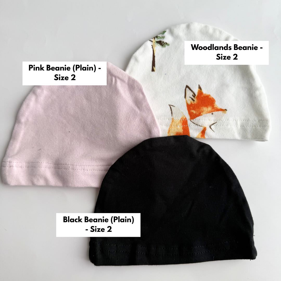 Clearance baby beanies size 2 in pink, woodlands fox design and black.