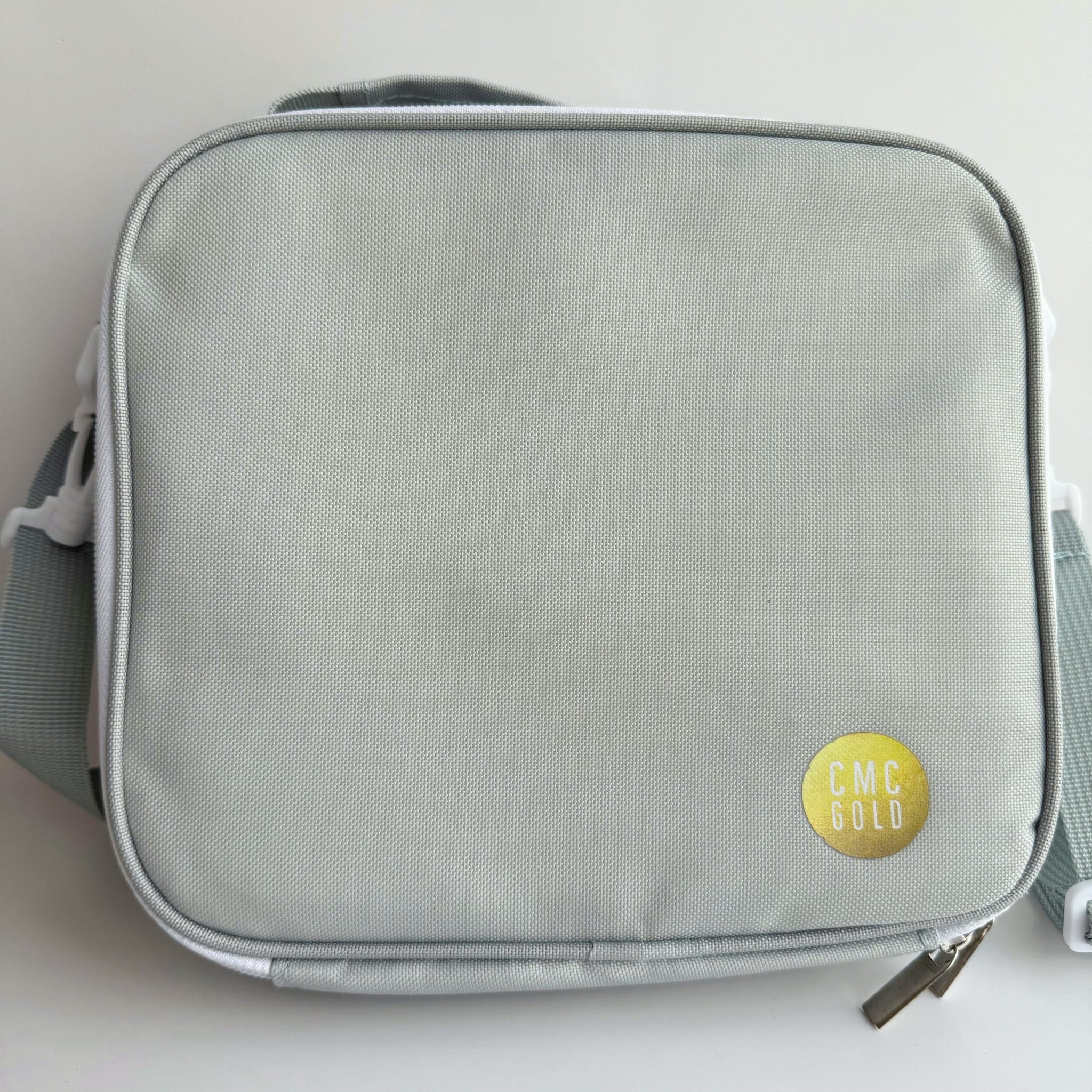 Sage insulated kids bento lunch bag with CMC Gold logo, simple minimalist design for school or daycare