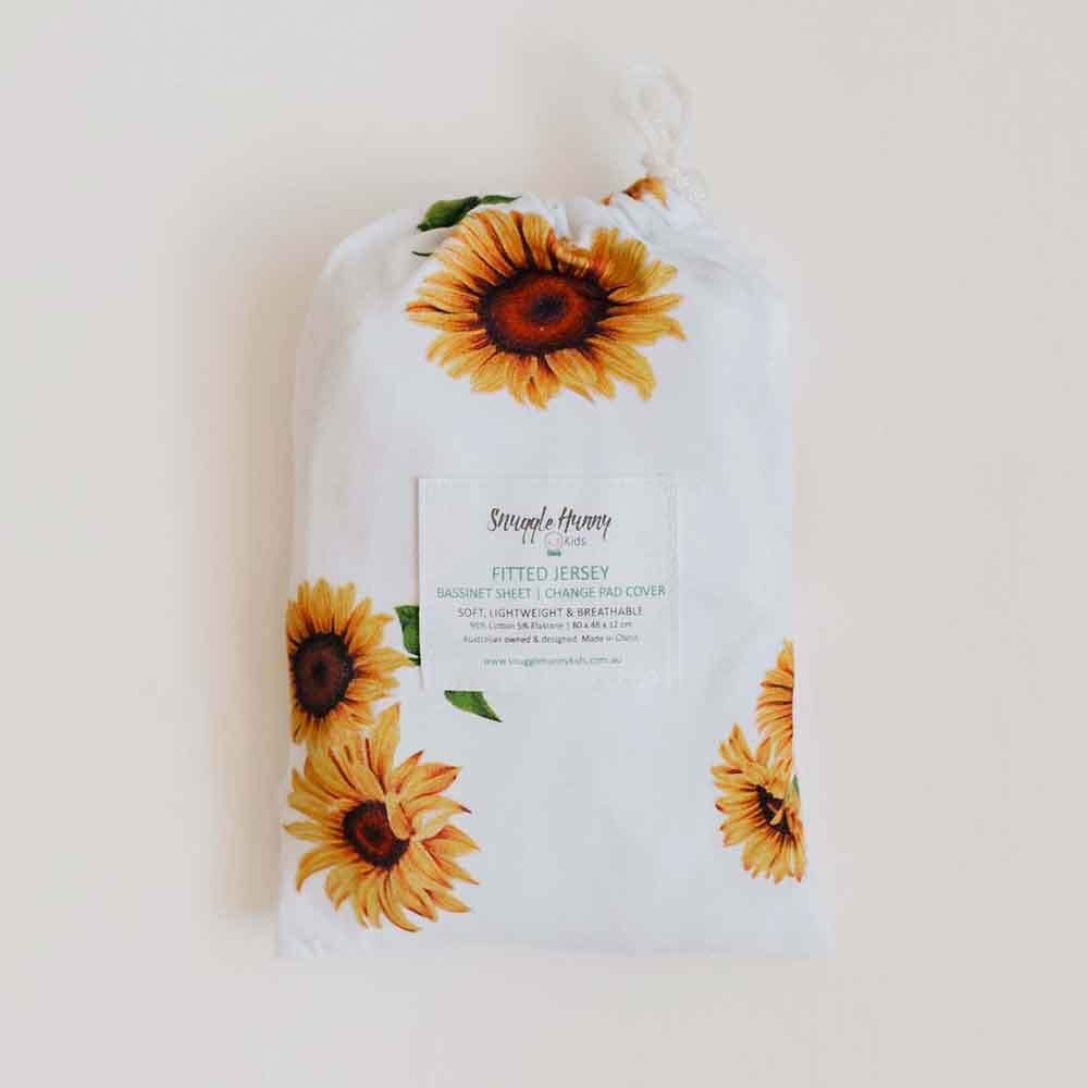 Sunflower baby cot sheet packaged in matching drawstring storage bag with sunflower pattern.