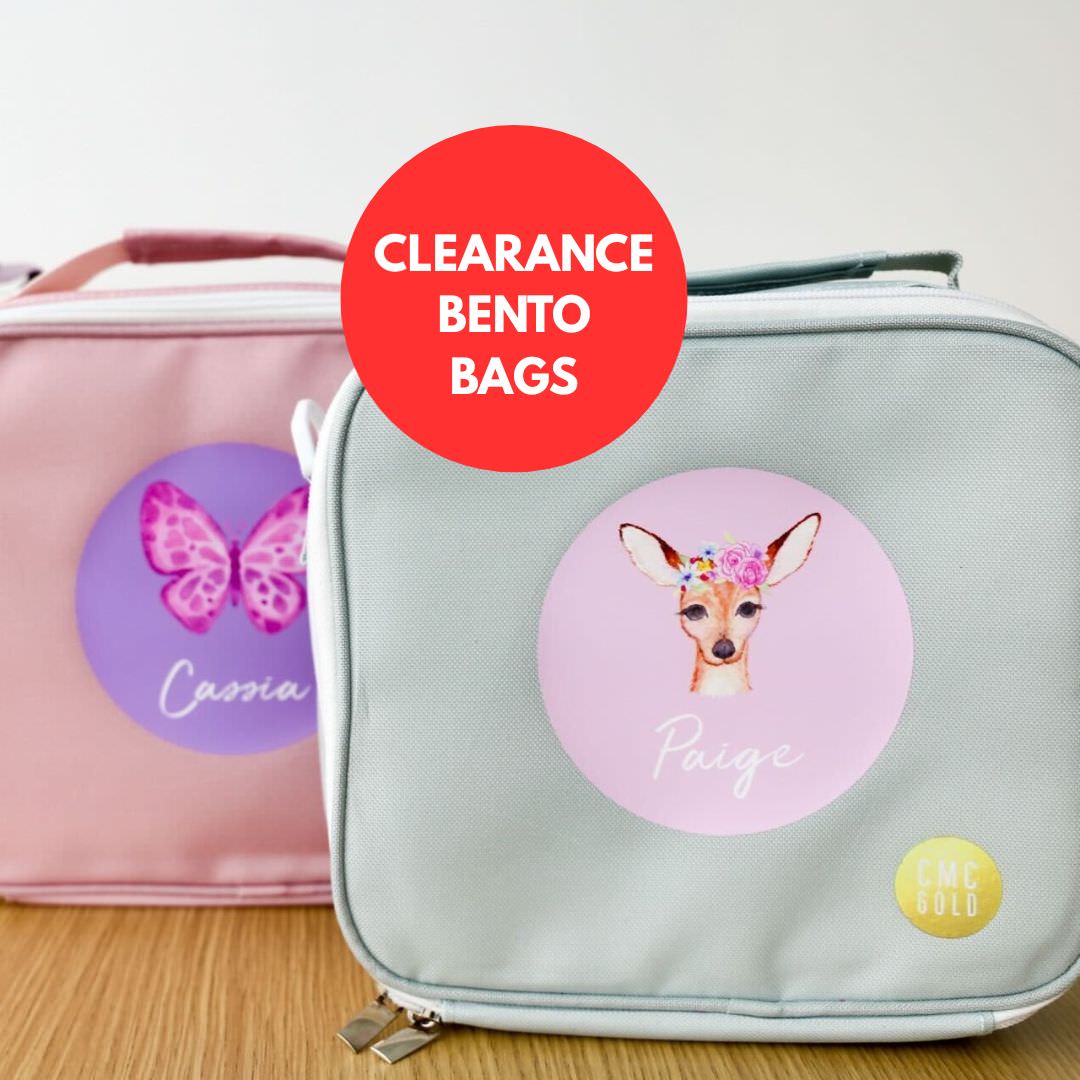Personalised kids bento lunch bags in pastel colours with custom names and designs on clearance sale from CMC Gold